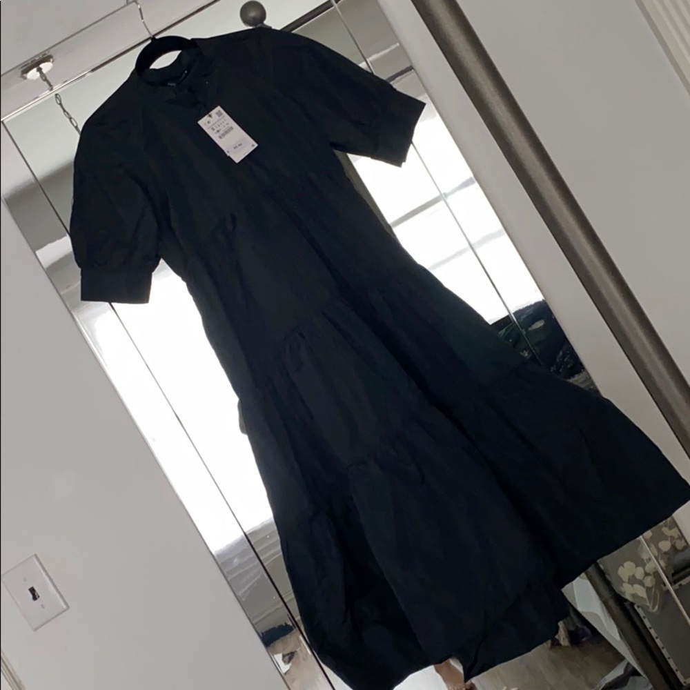 Tiered taffeta midi dress.